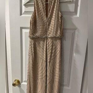 It worn just 1 time for my friends wedding and dry cleaning. Is seems like new